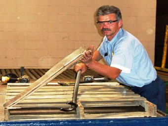 Pallet recycling begins with repairing damaged pallets